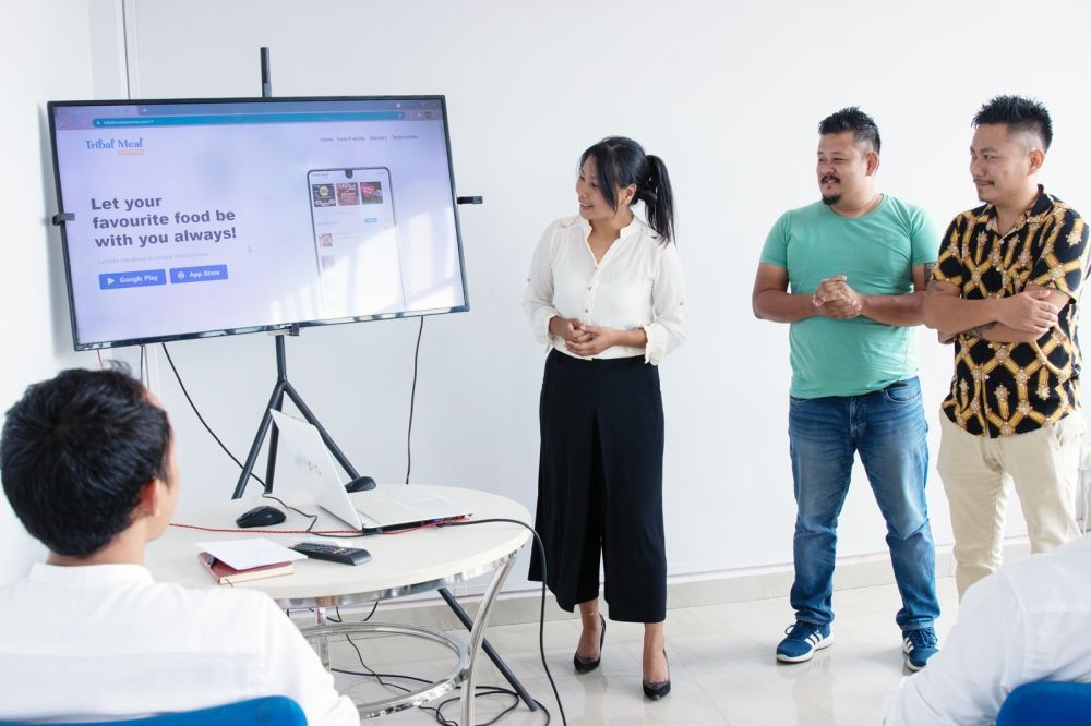 Director, YouthNet, Nuneseno Chase, and the two founding members of Tribal Meal Express, Imsunungsang and Lipoksasong Longkumer, at the launch of the ‘Tribal Meal Express’ food app at YouthNet Dimapur office on August 28. (Morung Photo)